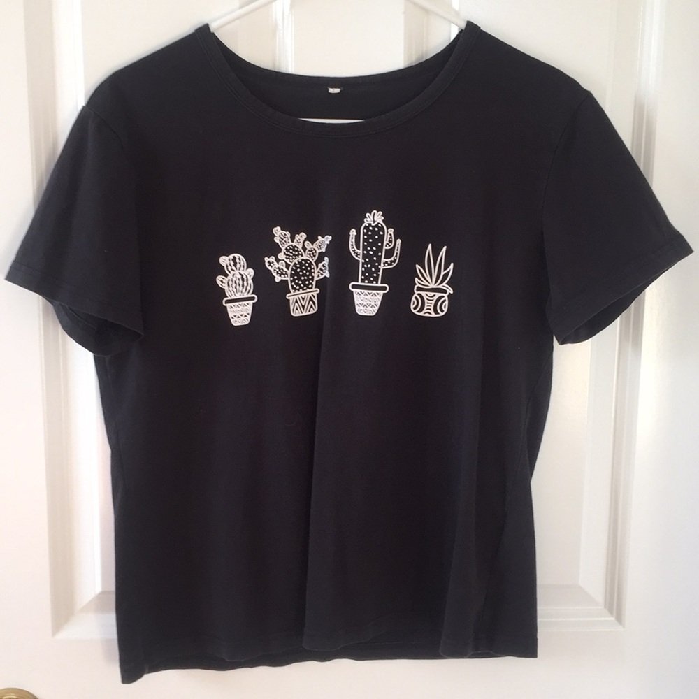black t shirt with cacti designs on front